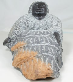 'Relaxing Woman' original Shona stone sculpture signed by Colleen Madamombe