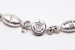 Senza titolo (Bracciale con 9 ciondoli, Adderal, Prozac, Valium)