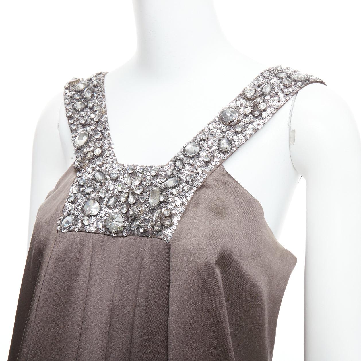 COLLETTE DINNIGAN 100% silk bronze embellished neckline mini dress S
Reference: WECN/A00060
Brand: Collette Dinnigan
Material: Silk
Color: Bronze, Clear
Pattern: Solid
Closure: Zip
Lining: Brown Silk
Extra Details: Back zip with laddered embellished