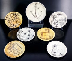 Collection of seven plates signed Atelier MADOURA Mad, hand-painted ceramic