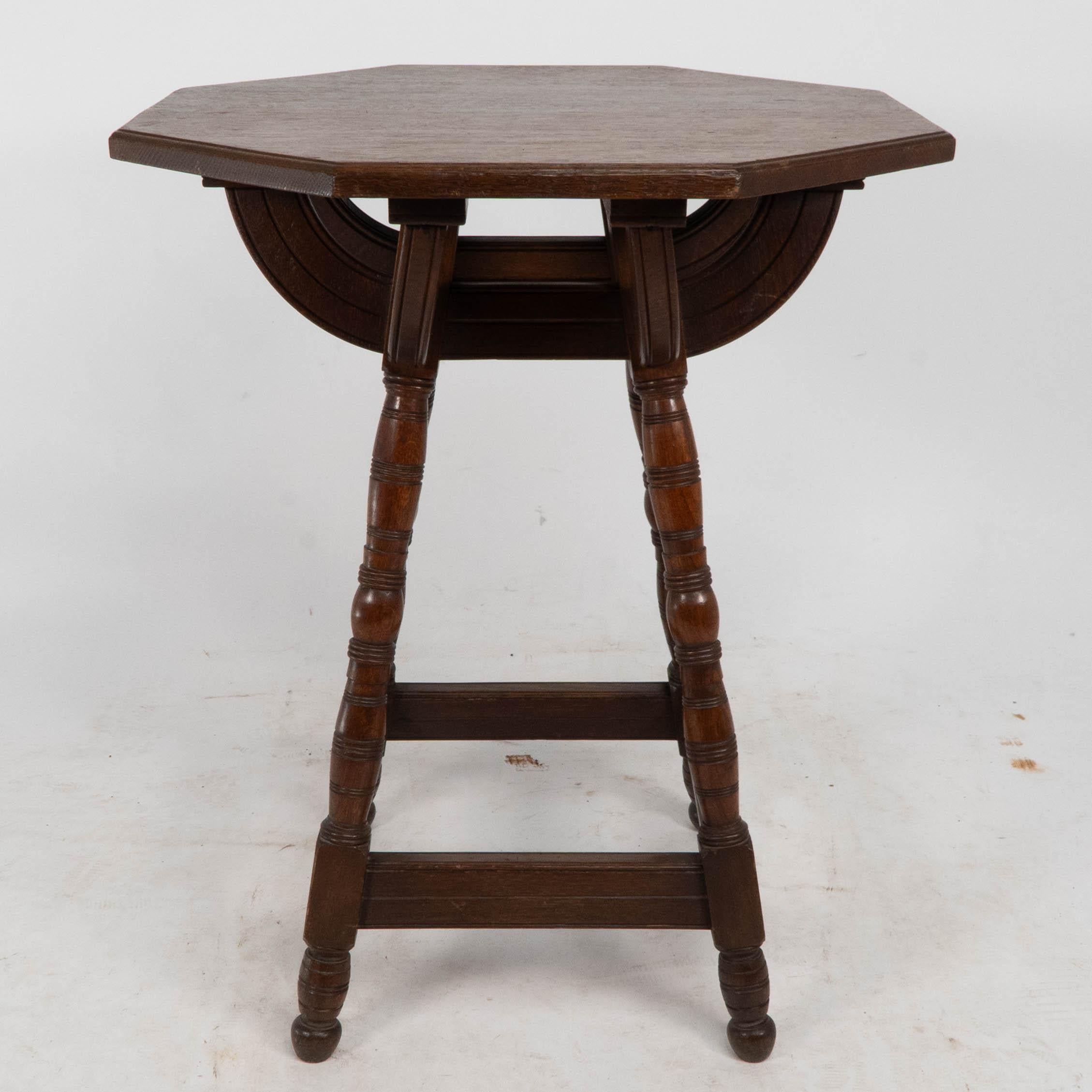 Collier and Plucknett. A rare Gothic Revival oak side table. A very accomplished solid architectural design which has a powerful look, with fine turned details and beautifully made.
