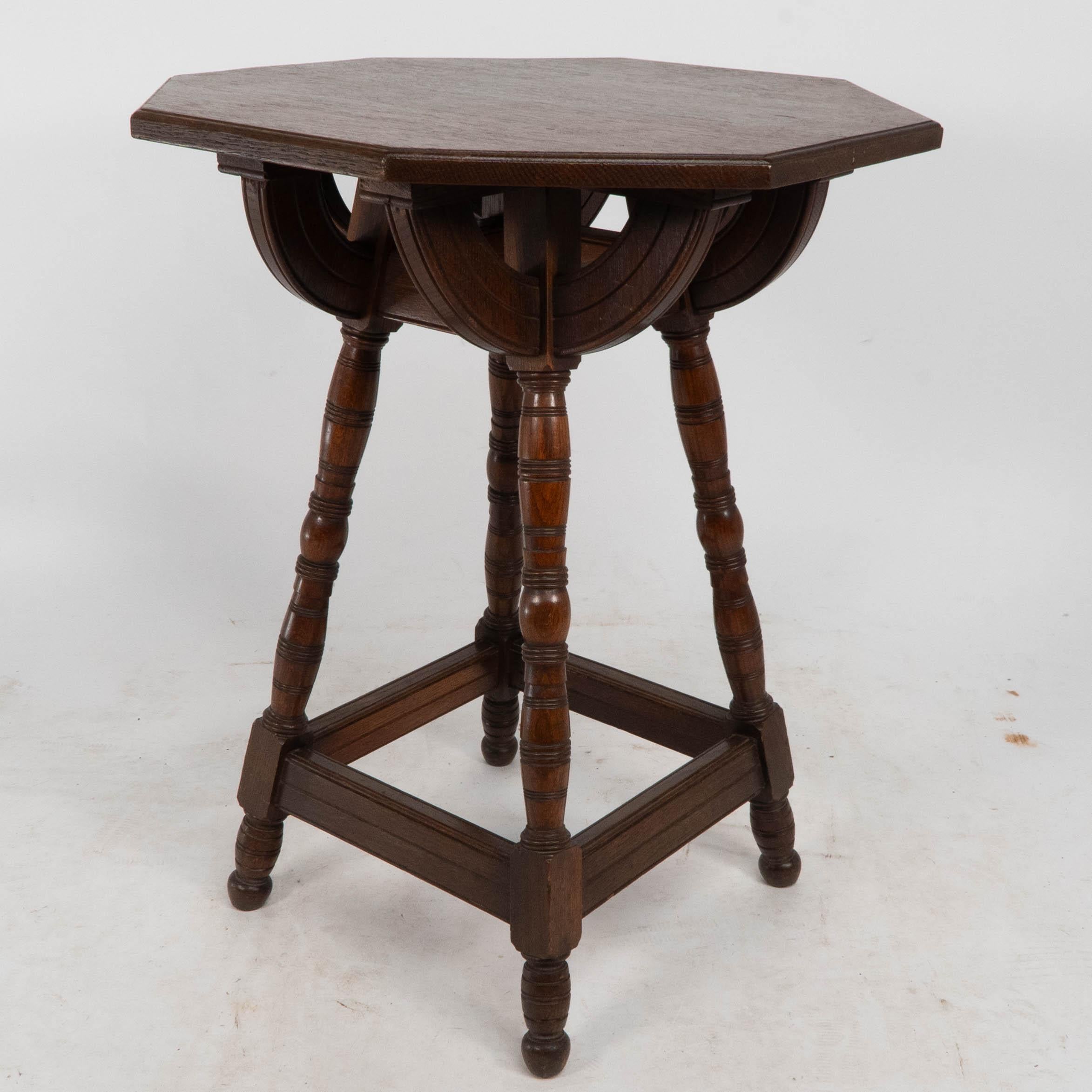 English Collier and Plucknett. A rare Gothic Revival oak side table For Sale