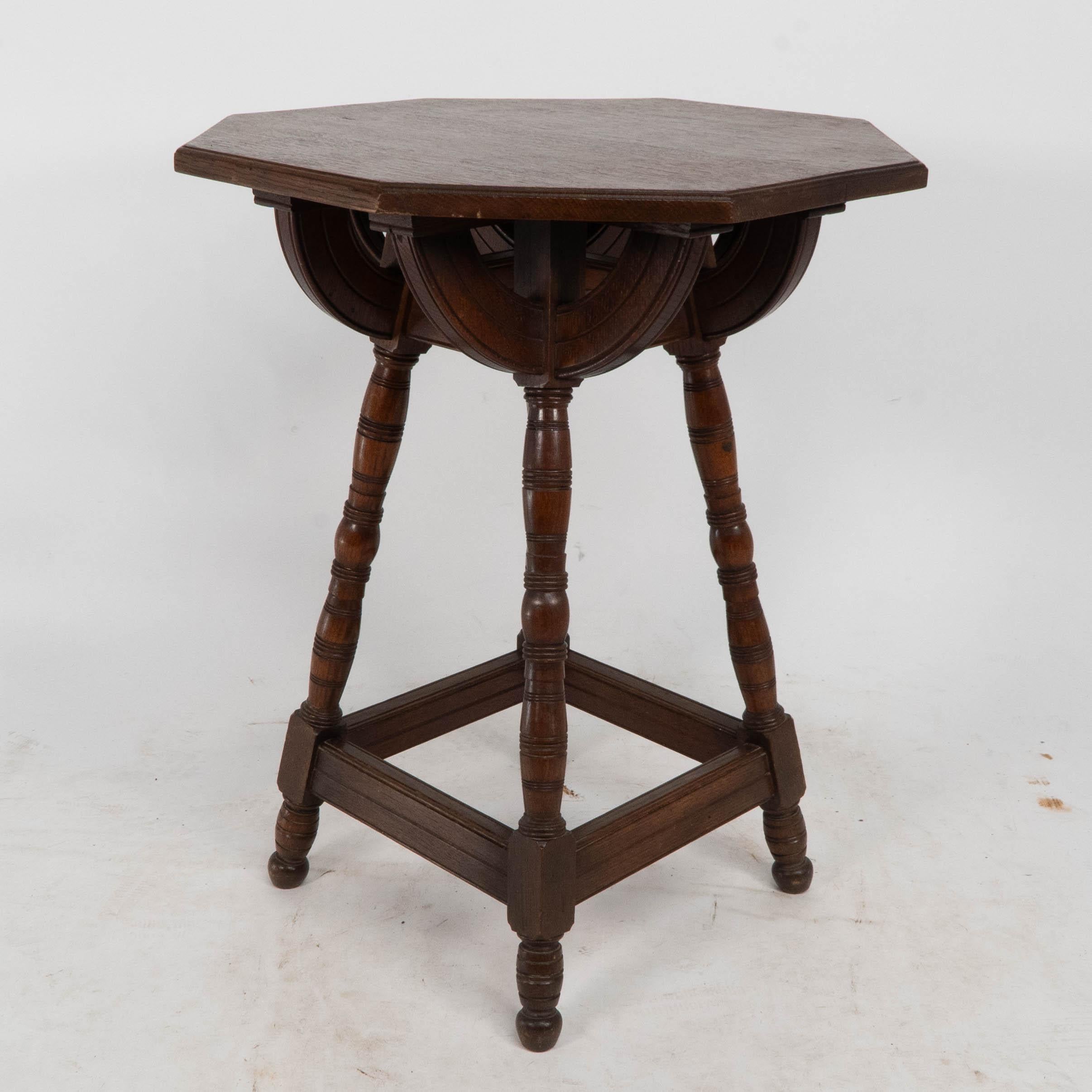 Mid-19th Century Collier and Plucknett. A rare Gothic Revival oak side table For Sale