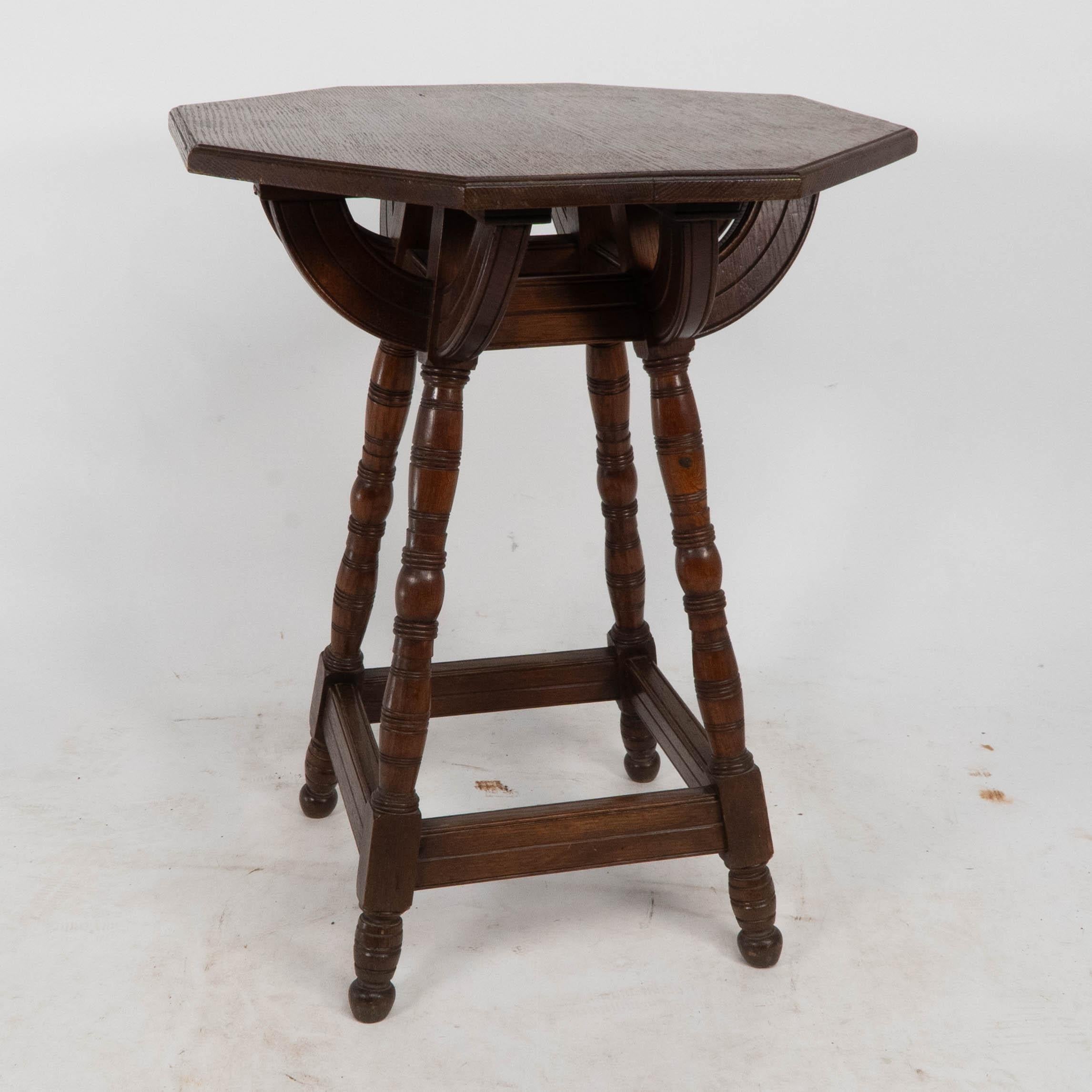 Collier and Plucknett. A rare Gothic Revival oak side table For Sale 1