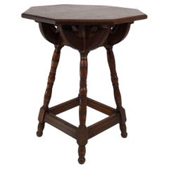 Antique Collier and Plucknett. A rare Gothic Revival oak side table