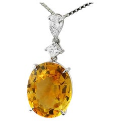 Zaffiro di Ceylon certificato GIA giallo-arancio 12,34 carati 2 diamanti 0,50 carati Collana