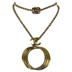 Collier CHANEL CC plaqué or doré 1996