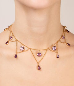Collier draperie Belle époque en or et améthyste
