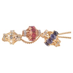 Collier in oro con tre cioncioli a cursore mobili