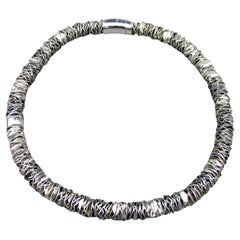 Collier ras de cou Pianegonda en argent massif , disques de métal pliés CO125