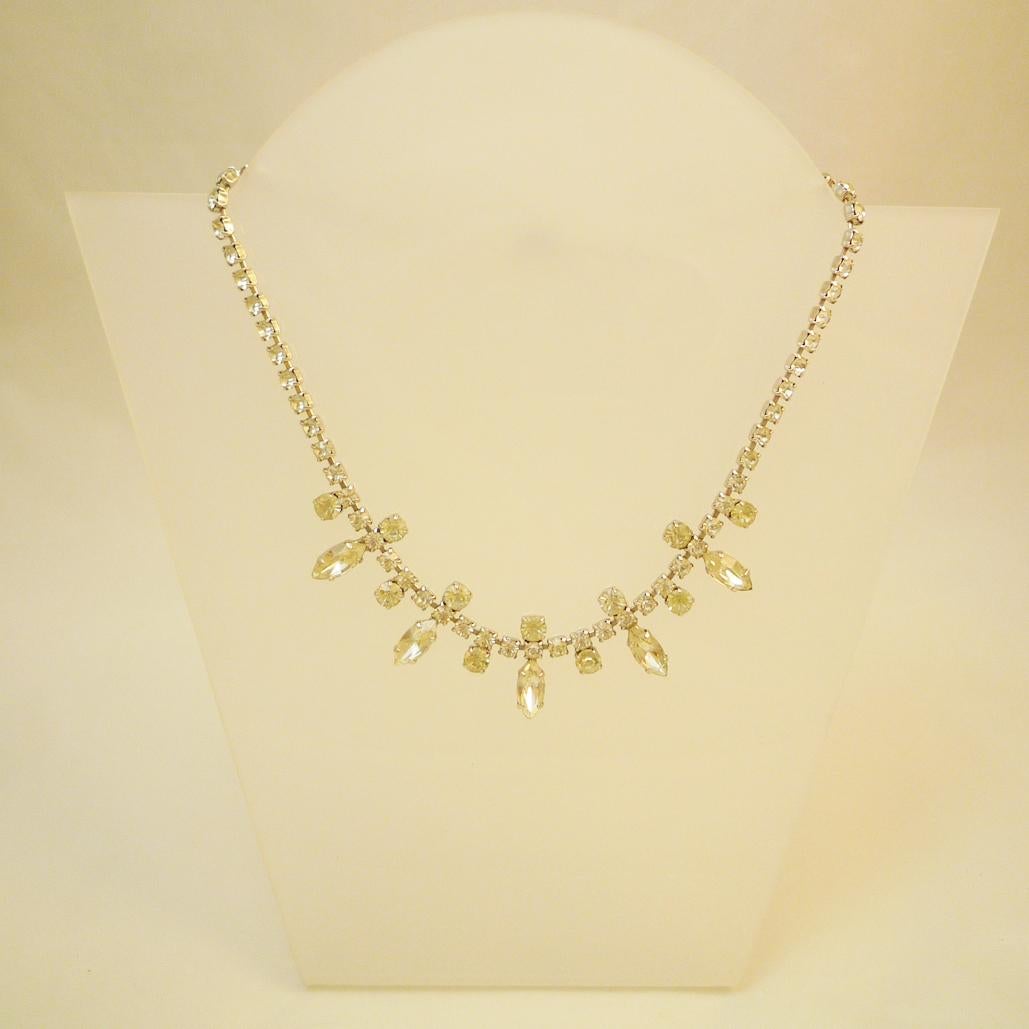 Collier Strass

Suitable for the evening to wear with the little black one, or also because of its simplicity in everyday life.

Chain length: 44 cm

ca: 1950