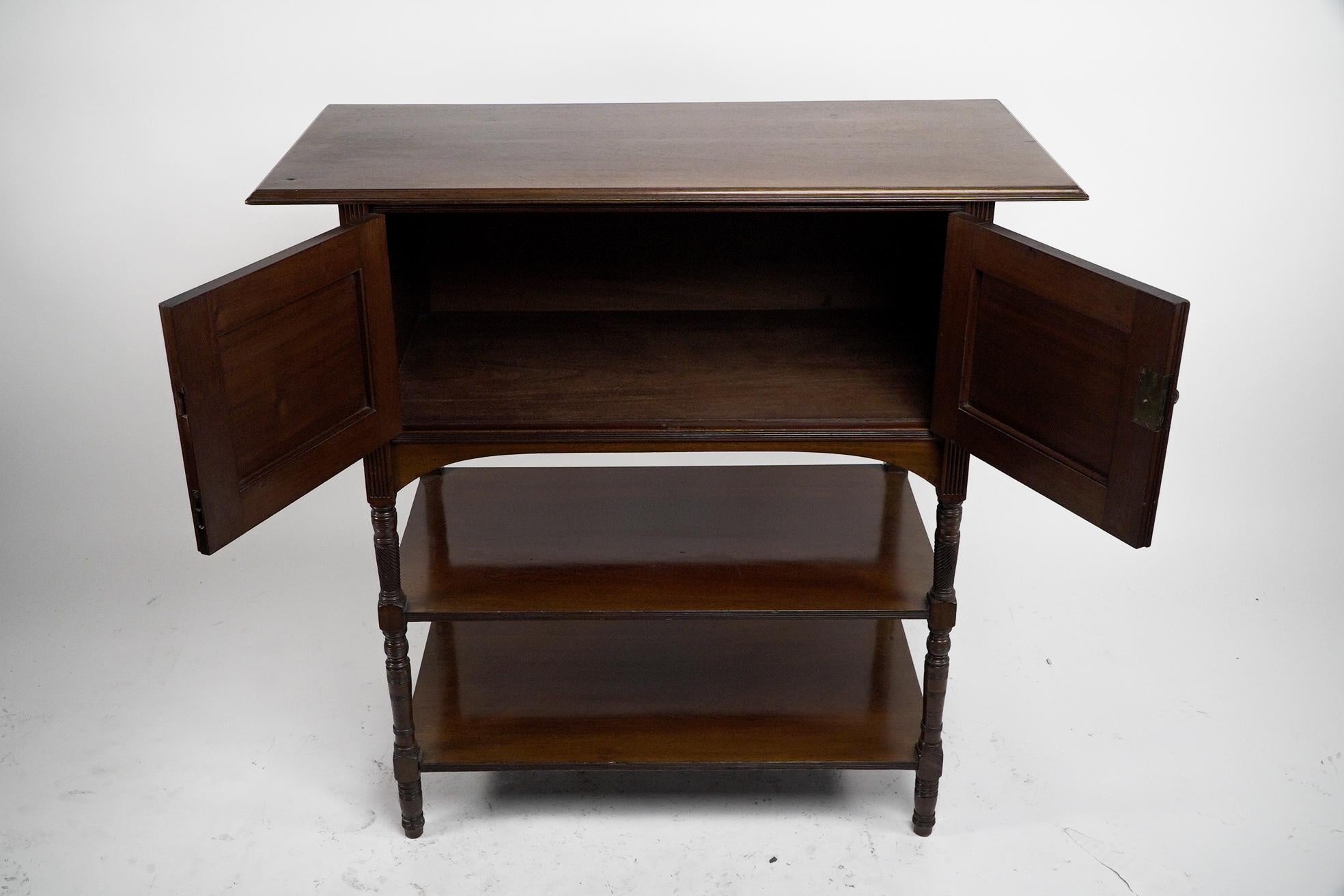 Collinson & Lock EW Godwin attri. An Aesthetic Movement walnut side cabinet. In Good Condition For Sale In London, GB