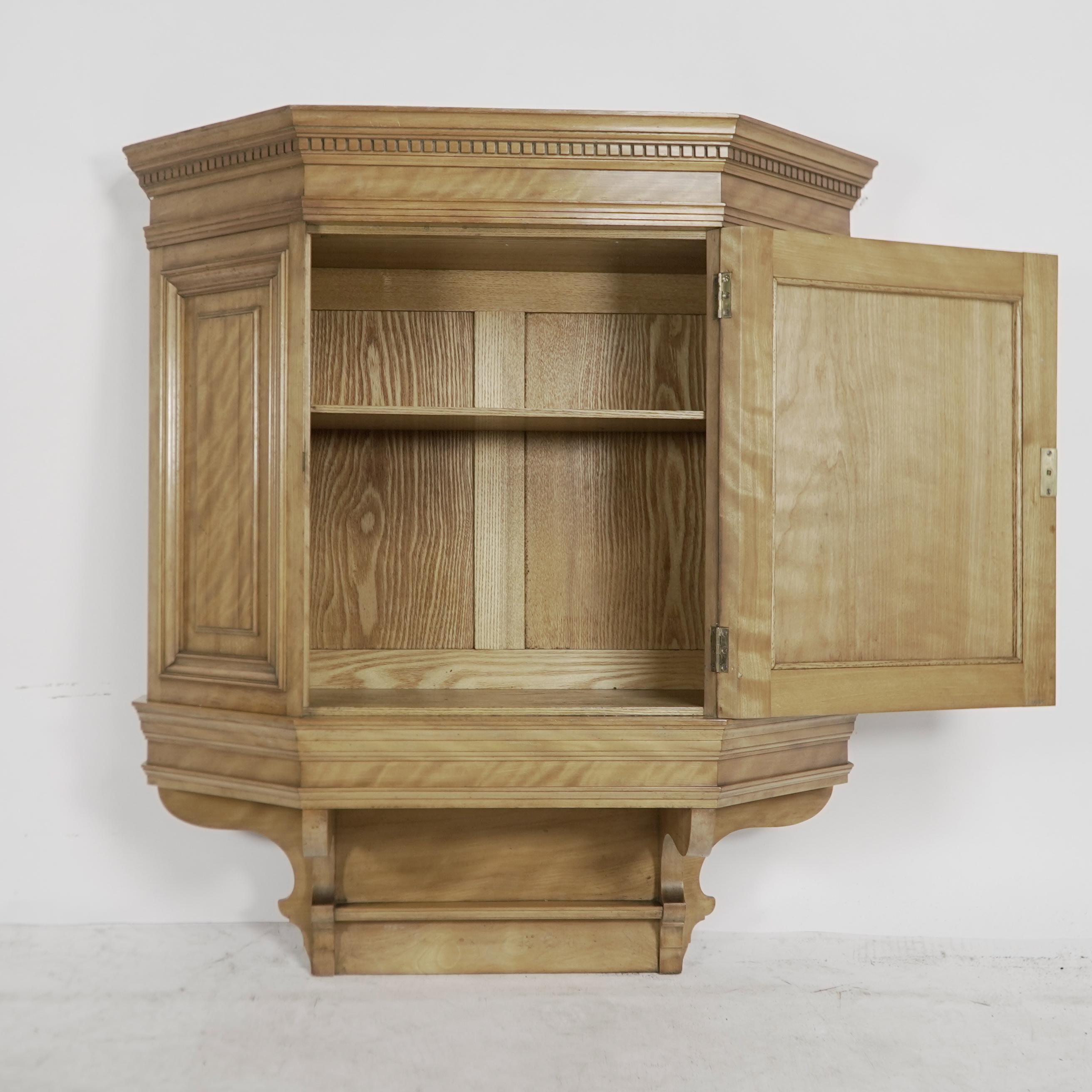 Collinson and Lock. An Aesthetic Movement Satin walnut breakfront wall cupboard For Sale 2