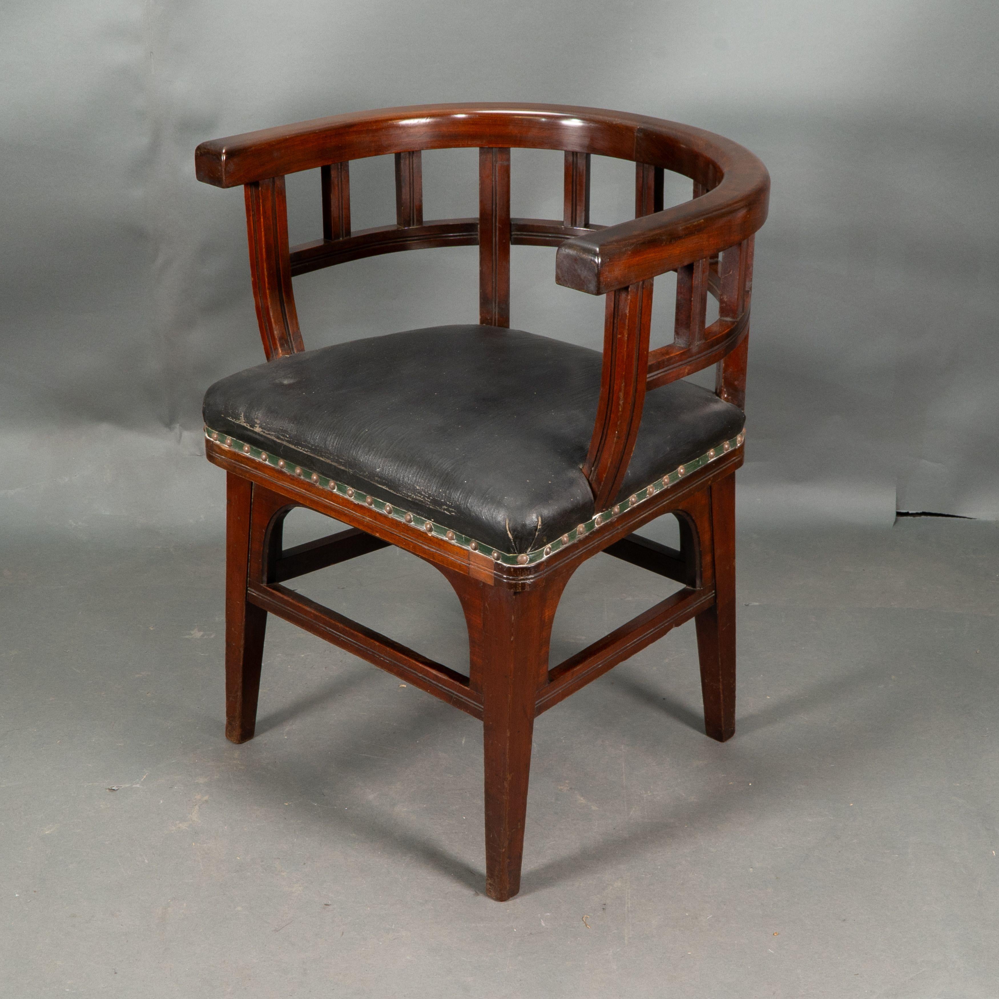 British Collinson and Lock, attributed. An Aesthetic Movement Walnut armchair For Sale