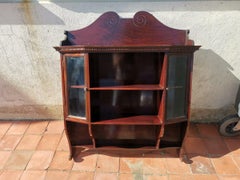 Collinson & Lock un mobile da parete in mogano smaltato dell'Aesthetic Movement inglese