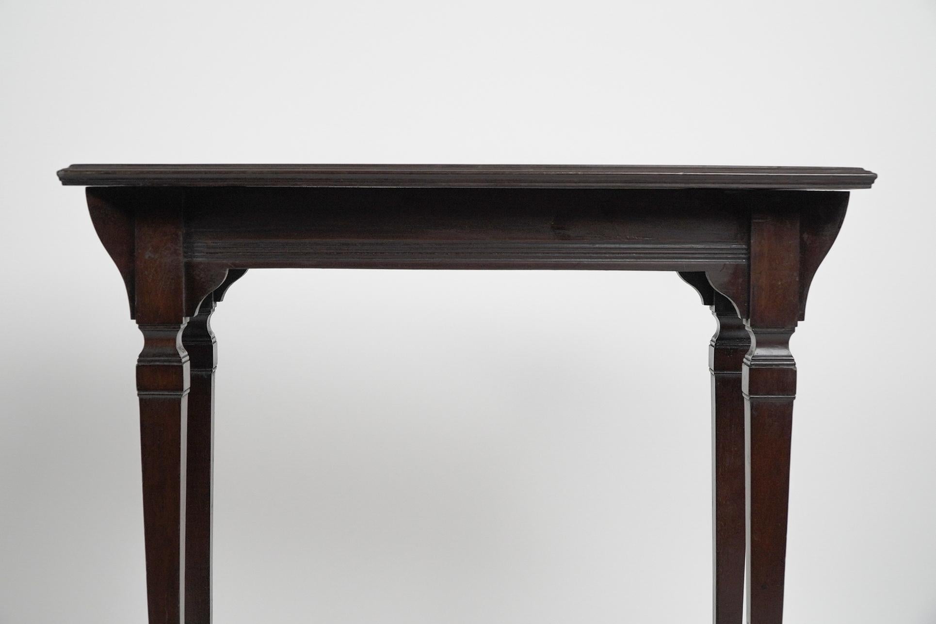 Collinson & Lock (attributed). A small Aesthetic Movement mahogany side table. For Sale 4
