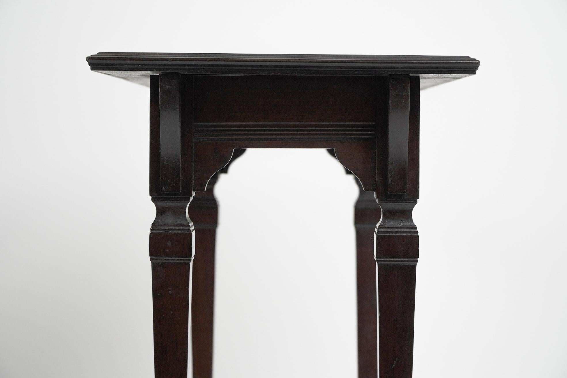 Collinson & Lock (attributed). A small Aesthetic Movement mahogany side table. For Sale 2