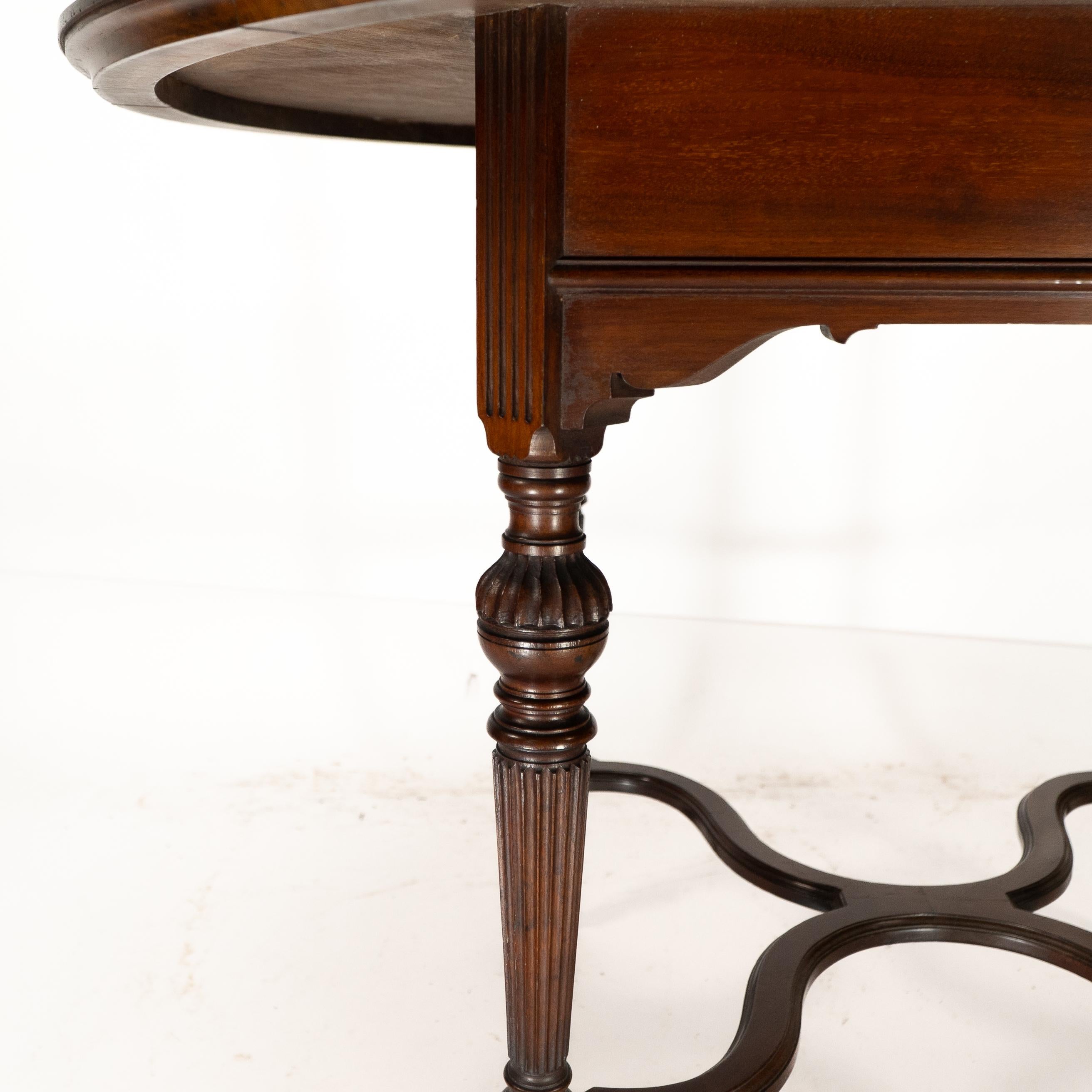 Collinson & Lock attributed. An Aesthetic Movement walnut circular center table For Sale 5
