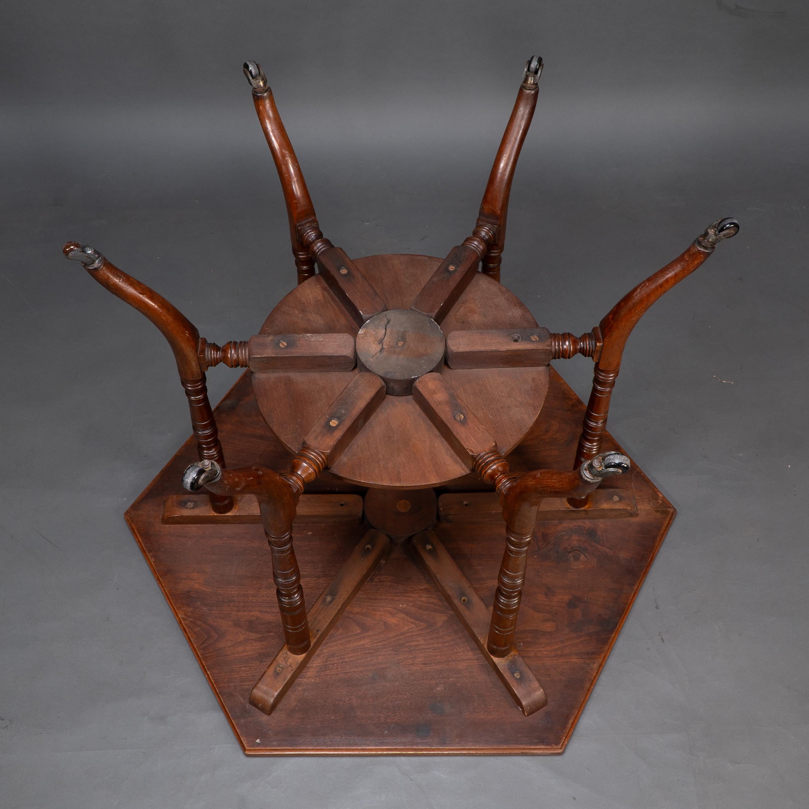 Collinson & Lock attributed. An Aesthetic Movement walnut octagonal center table For Sale 14