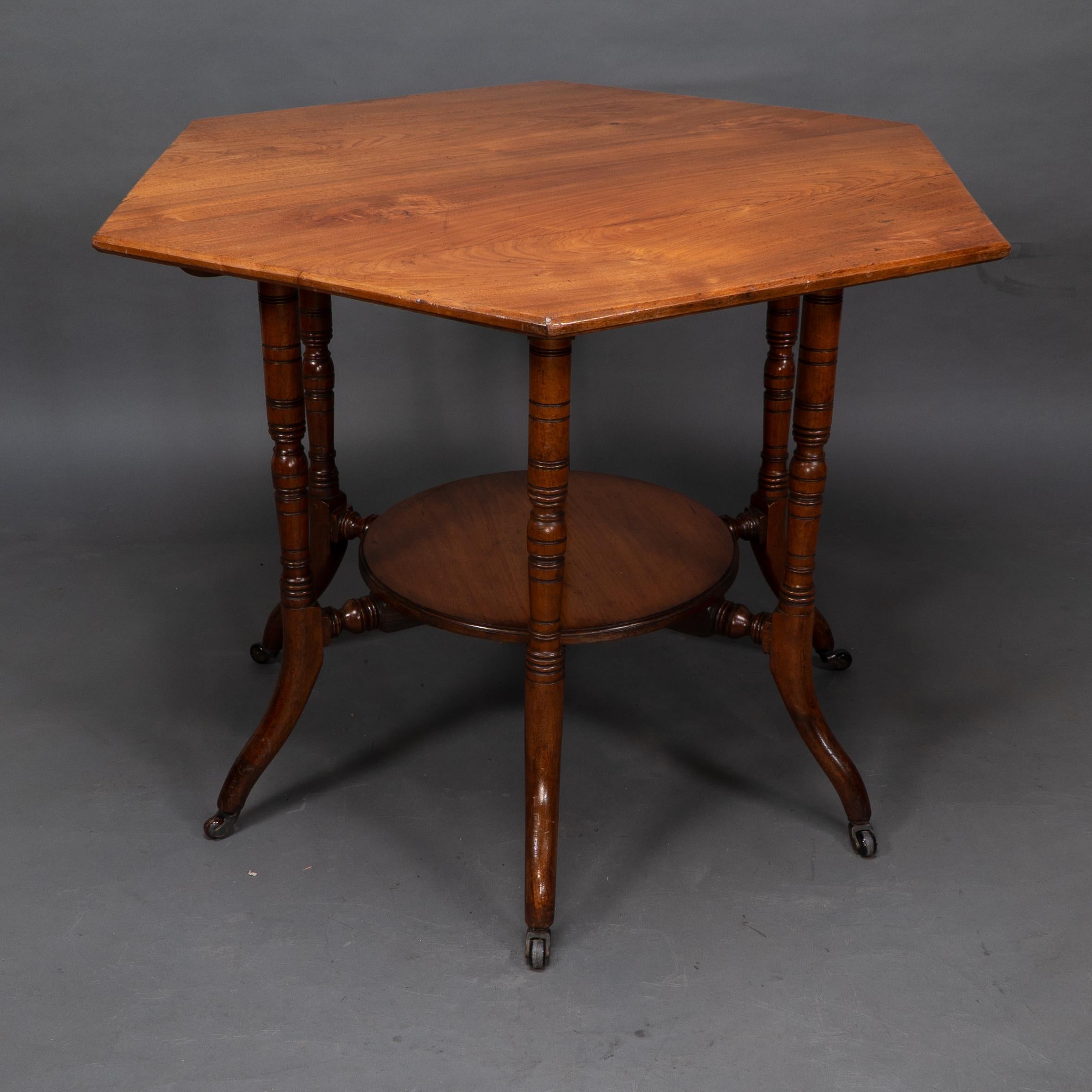 Collinson & Lock attributed. An Aesthetic Movement walnut octagonal center table In Good Condition For Sale In London, GB