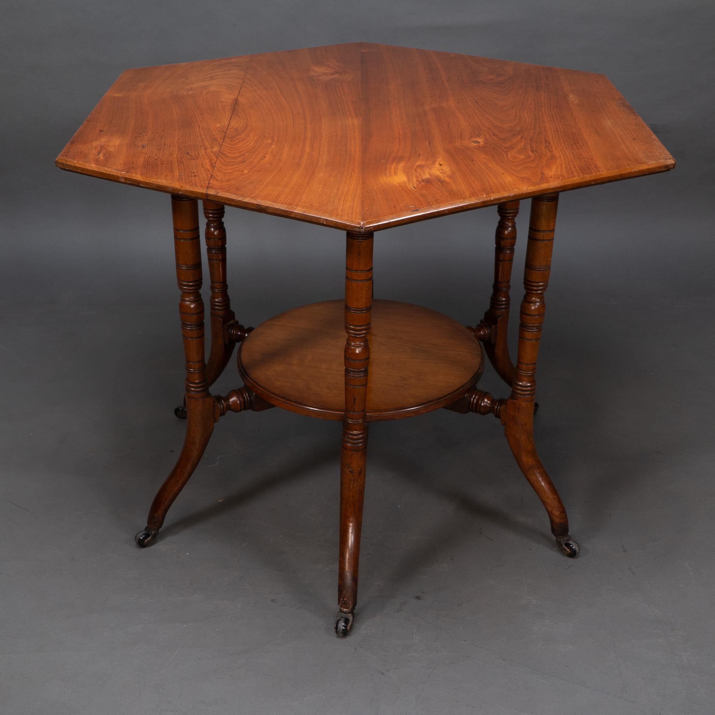 Late 19th Century Collinson & Lock attributed. An Aesthetic Movement walnut octagonal center table For Sale