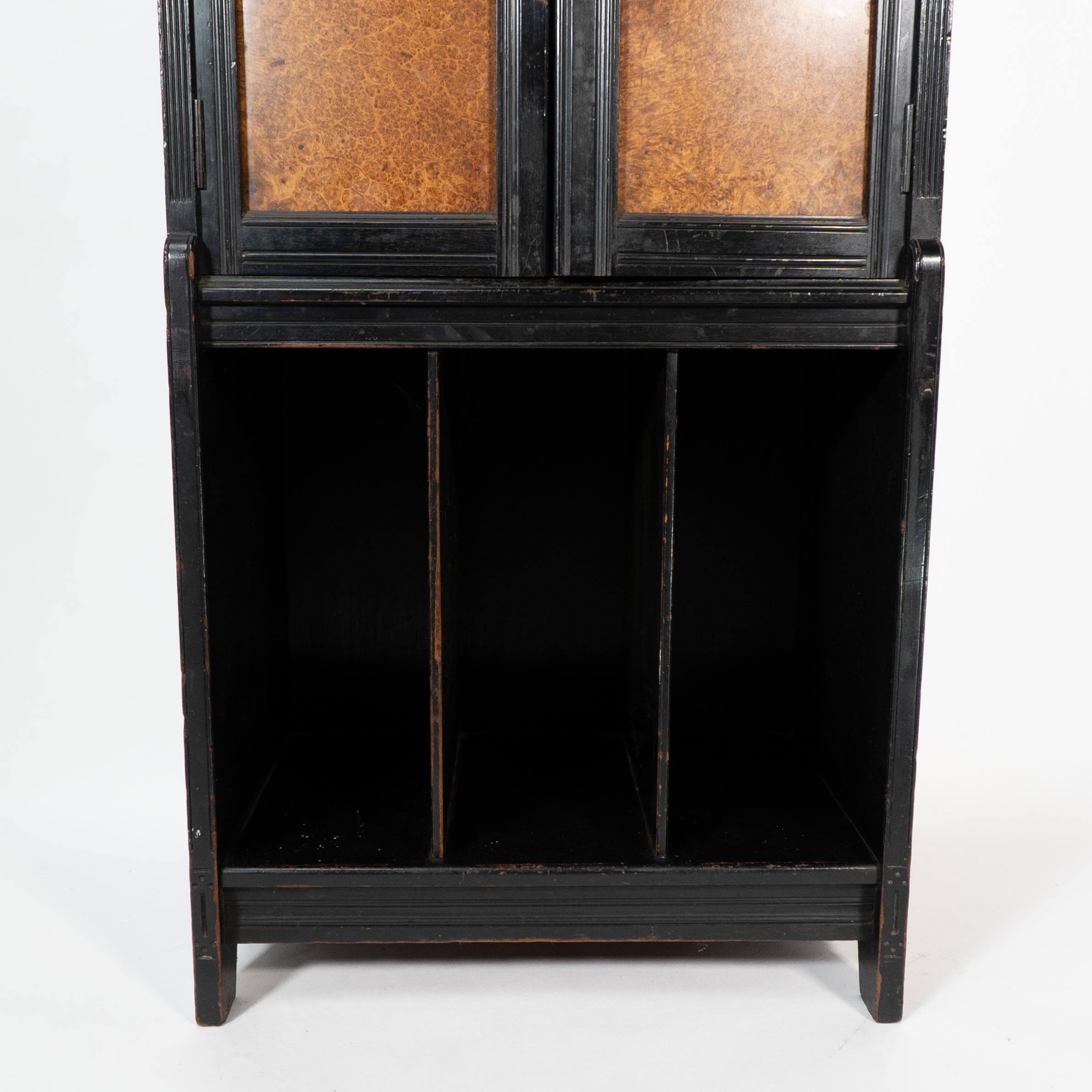 Collinson & Walton. An Aesthetic Movement burr walnut & ebonized music cabinet For Sale 7