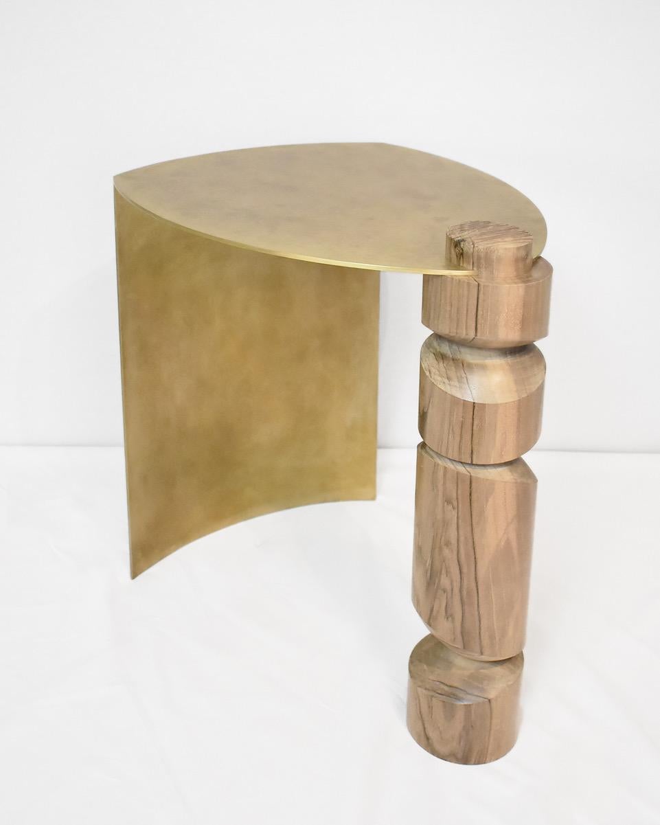 Collision side table made by Samuel Latour in brass and walnut wood.

Techniques: Brass: bending, welding and cold patina, Walnut varnish: regular and eccentric turning, glossy encaustic

Edition of 12 copies signed S. LATOUR and