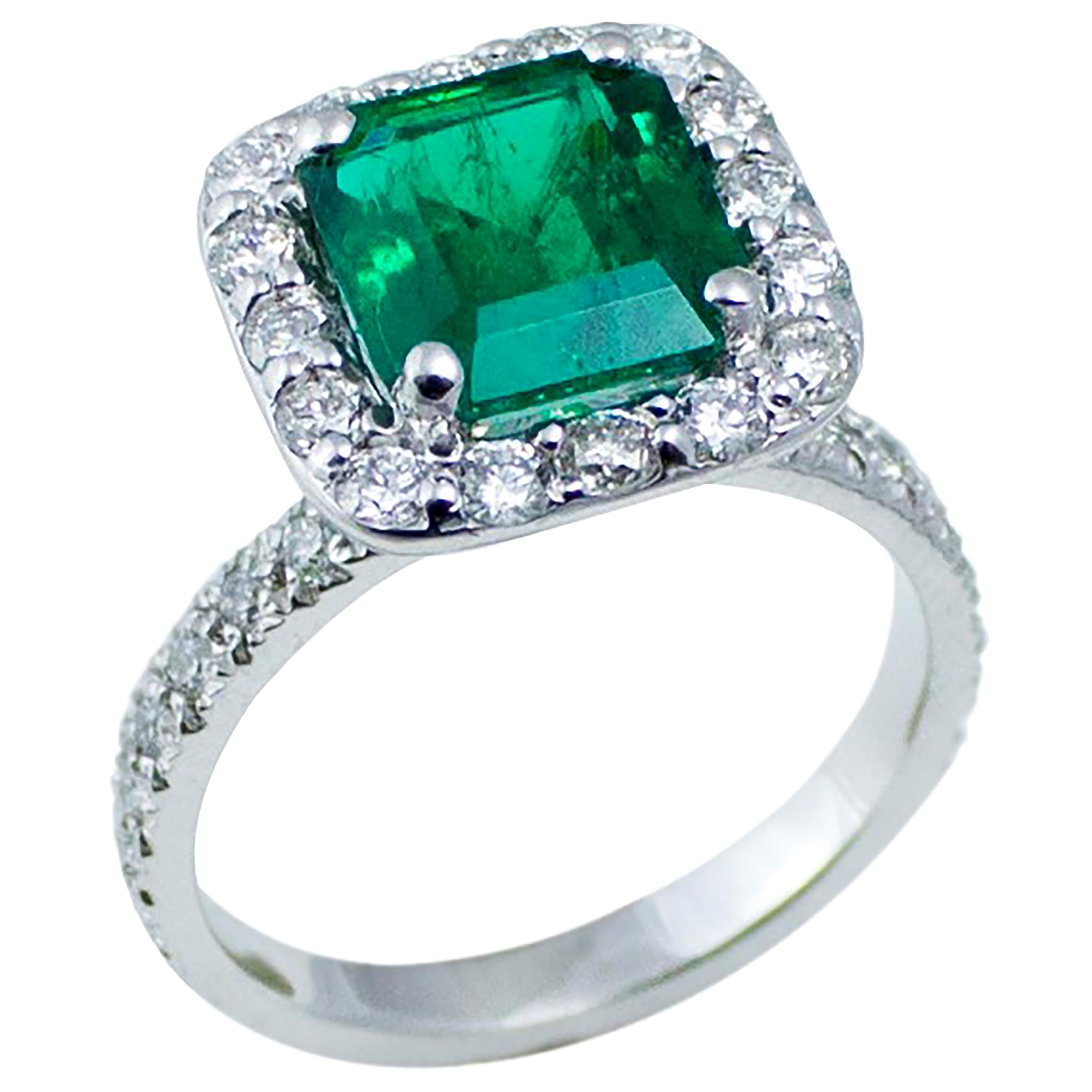 One of a Kind, GIA, and AGL certified platinum cocktail cluster ring 
Emerald cut emerald weighing 2.09 carat
Surrounded by pave-set diamonds weighing 0.80 carats  
Diamond quality G VS  
Ring size 6 In Stock
Emerald hue tone color is deep emerald