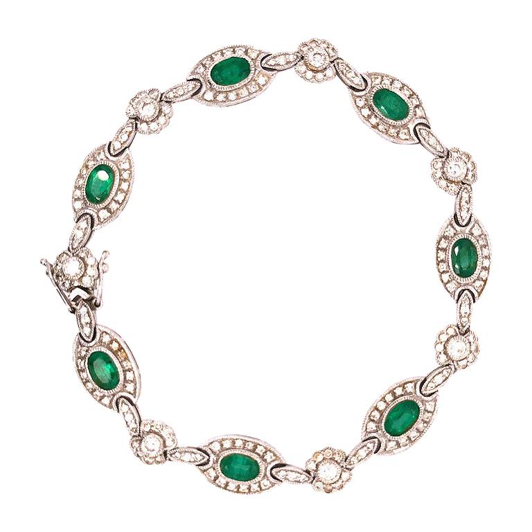 Colombia Emerald and Diamond Halo Tennis Bracelet, in 18 Karat White Gold For Sale