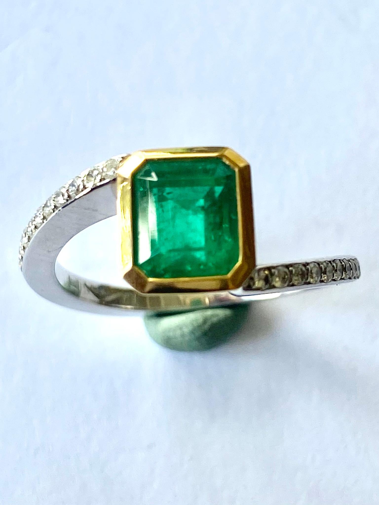 Emerald Cut Colombia Emerald of 1.30 Ct and Diamonds Sert in a 18K, Gold Hand Made Ring For Sale