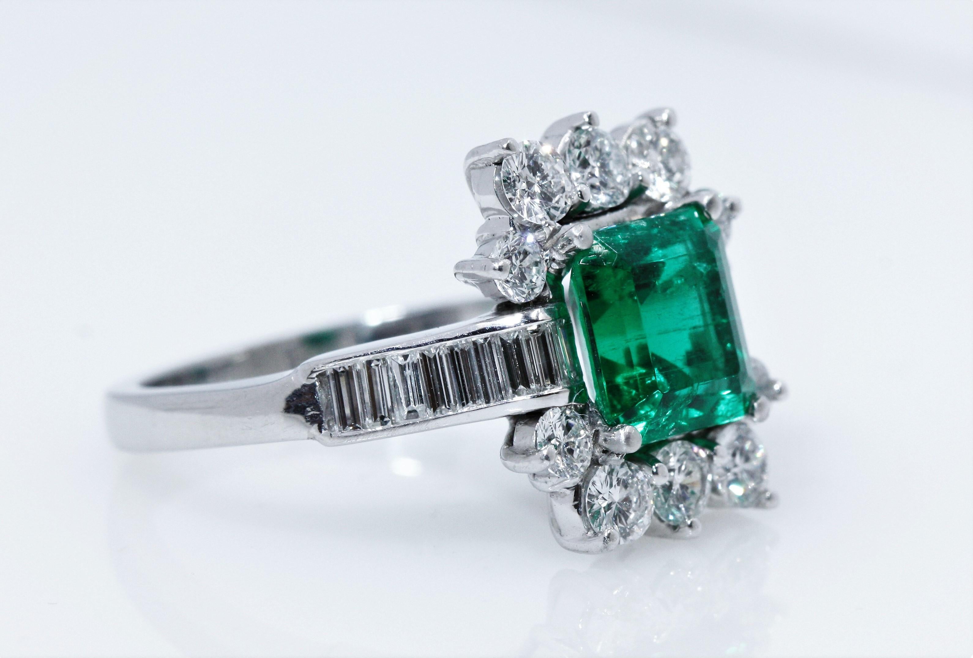 Comments: Set in a white metal ring with several round and baguette diamonds
Mineral Type: Natural Beryl
Variety: Emerald
Measurements: Approx. 7.79 x 7.38 x 5.59 mm
Shape: Rectangular
Color: Green
Cutting Style: Emerald Cut
Origin: Colombia
Item
