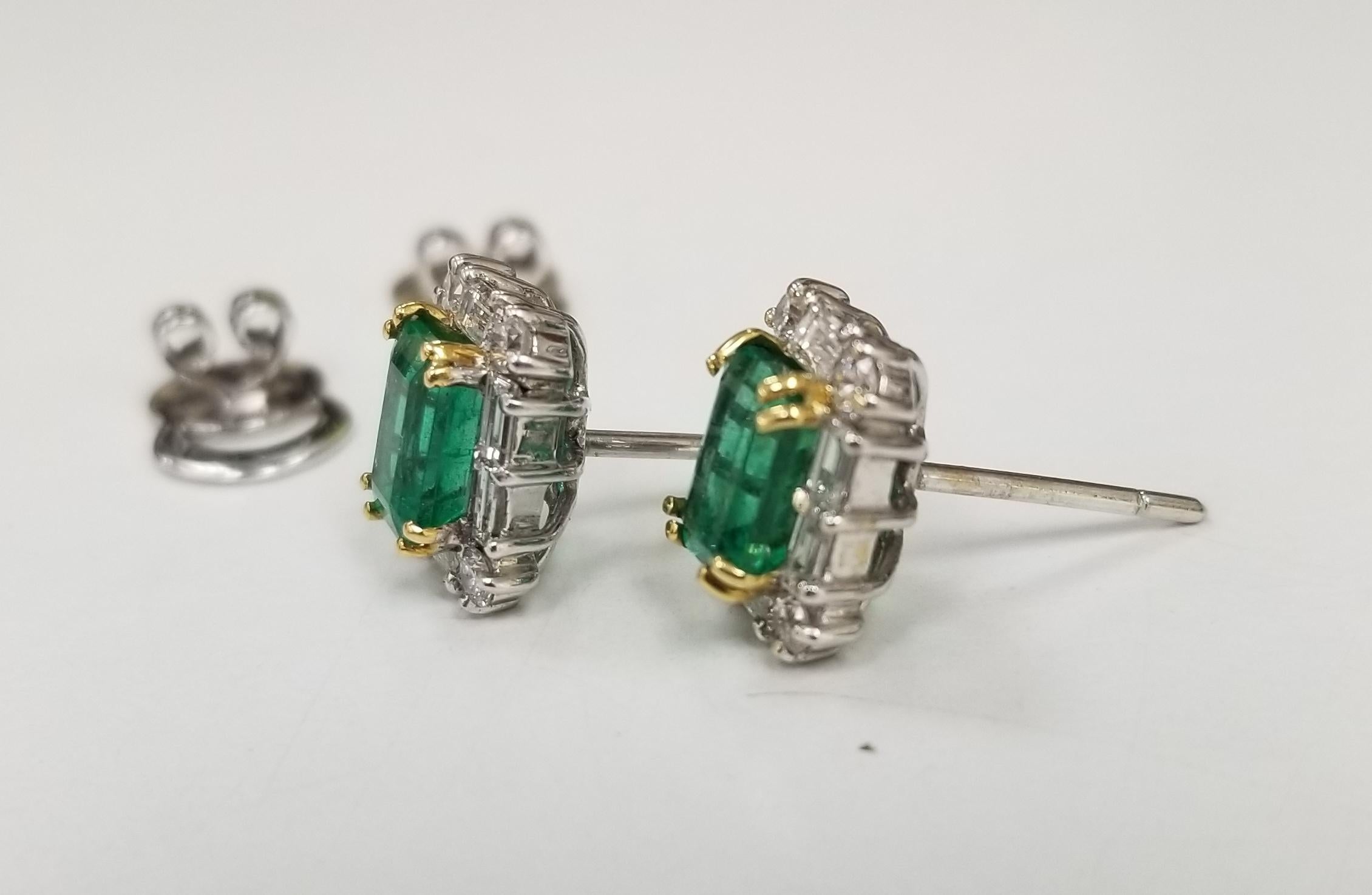 Contemporary Colombian 2.03cts. Emerald-Cut Emeralds with Diamond Halo Set in 18k White Gold For Sale