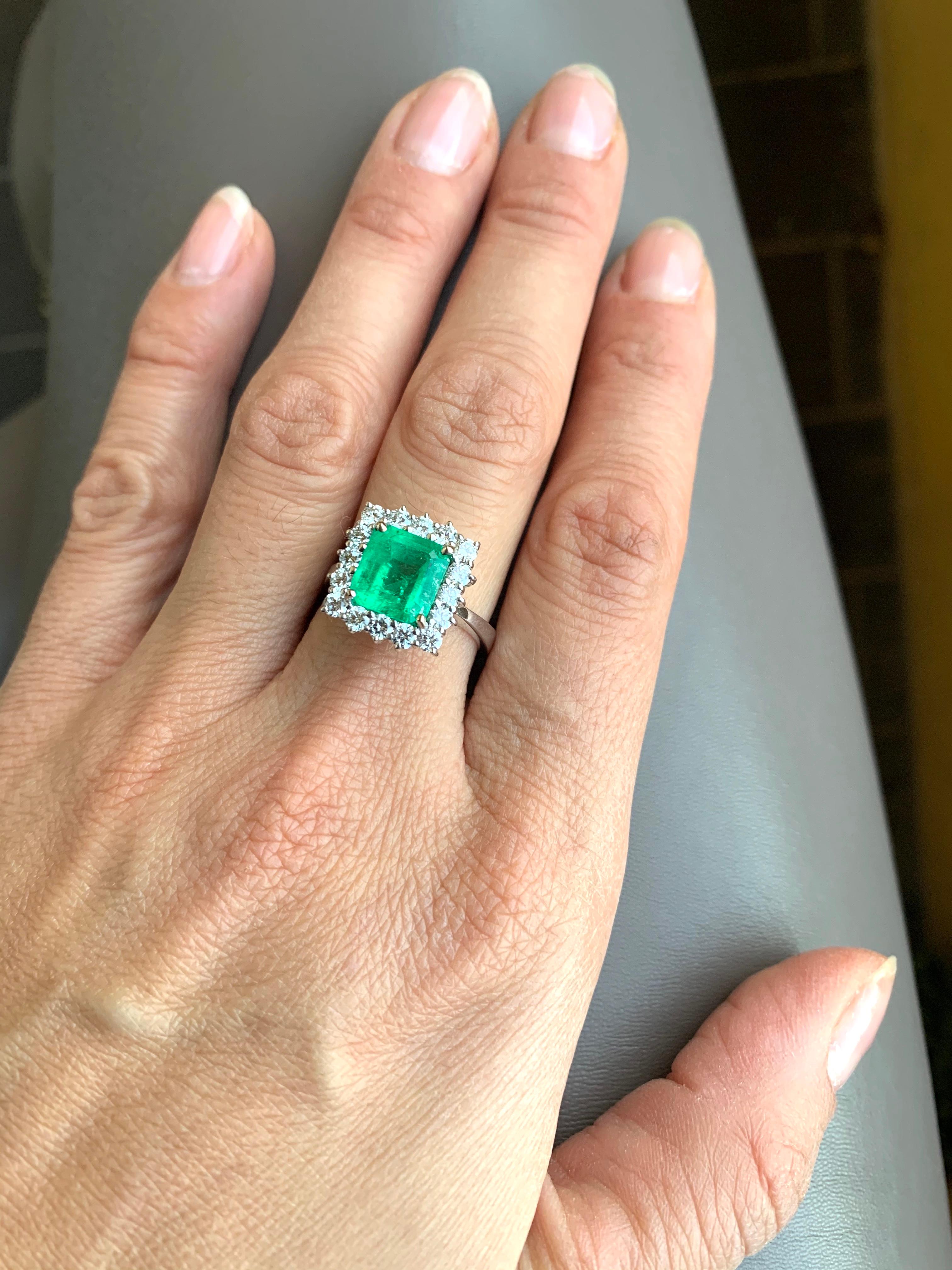 3.26 Carat Colombian Emerald and 1.02 Carat 18 Kt White Gold Halo Diamond Ring  8