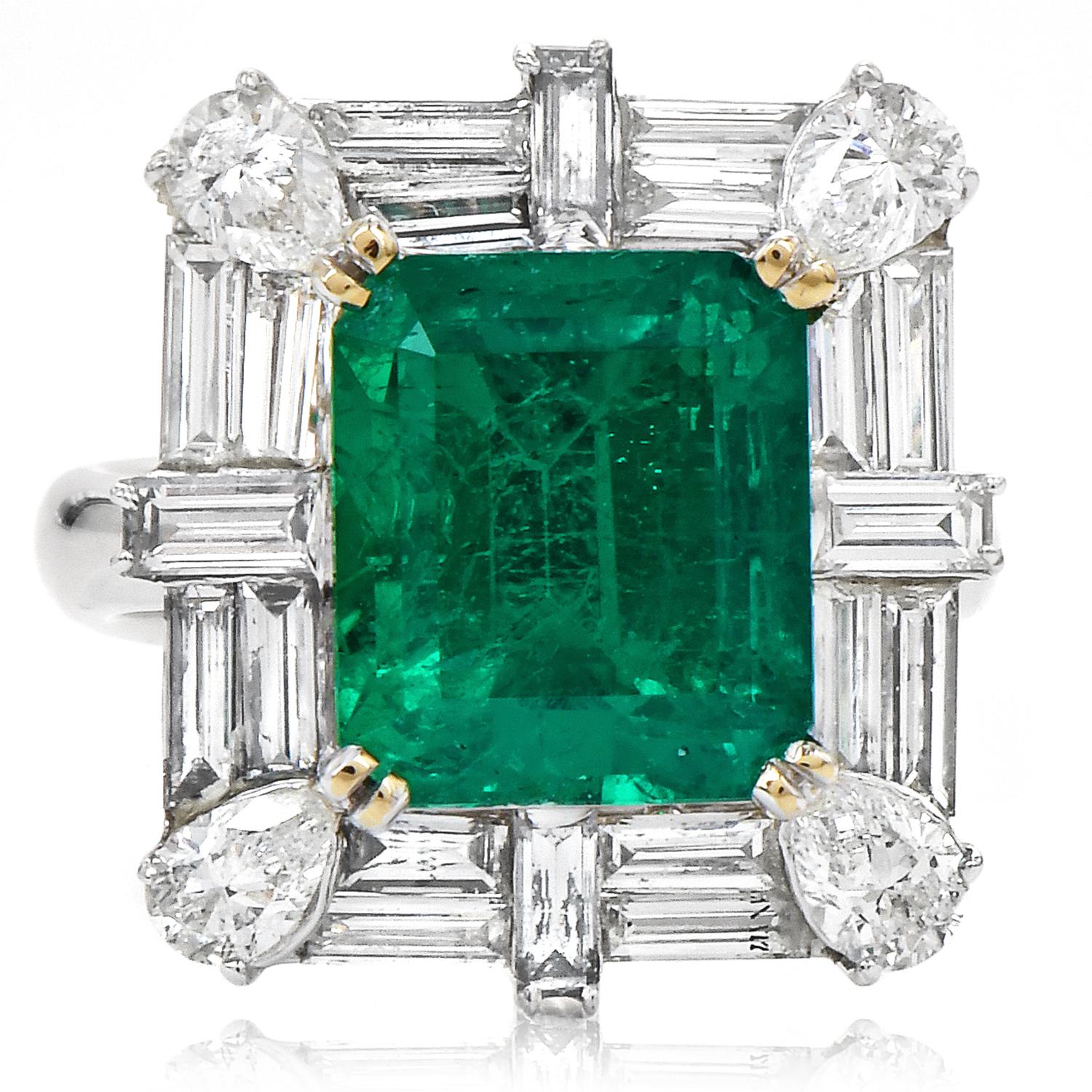 A Geometric RARE cocktail ring with an exquisite vibrant MUZO Colombian Emerald.

Crafted in solid 18K White Gold

This colorful ring is entered with a Certified Untreated Colombian Emerald, Octagonal Emerald Cut, Prong Set, 5.53 carats in