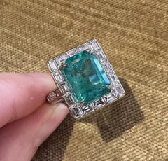 Colombian 6.07 carats Emerald and Diamond Ring in Platinum