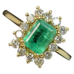 Colombian Emerald and 0.40 Carat Diamond 18 Carat Gold Cluster Ring