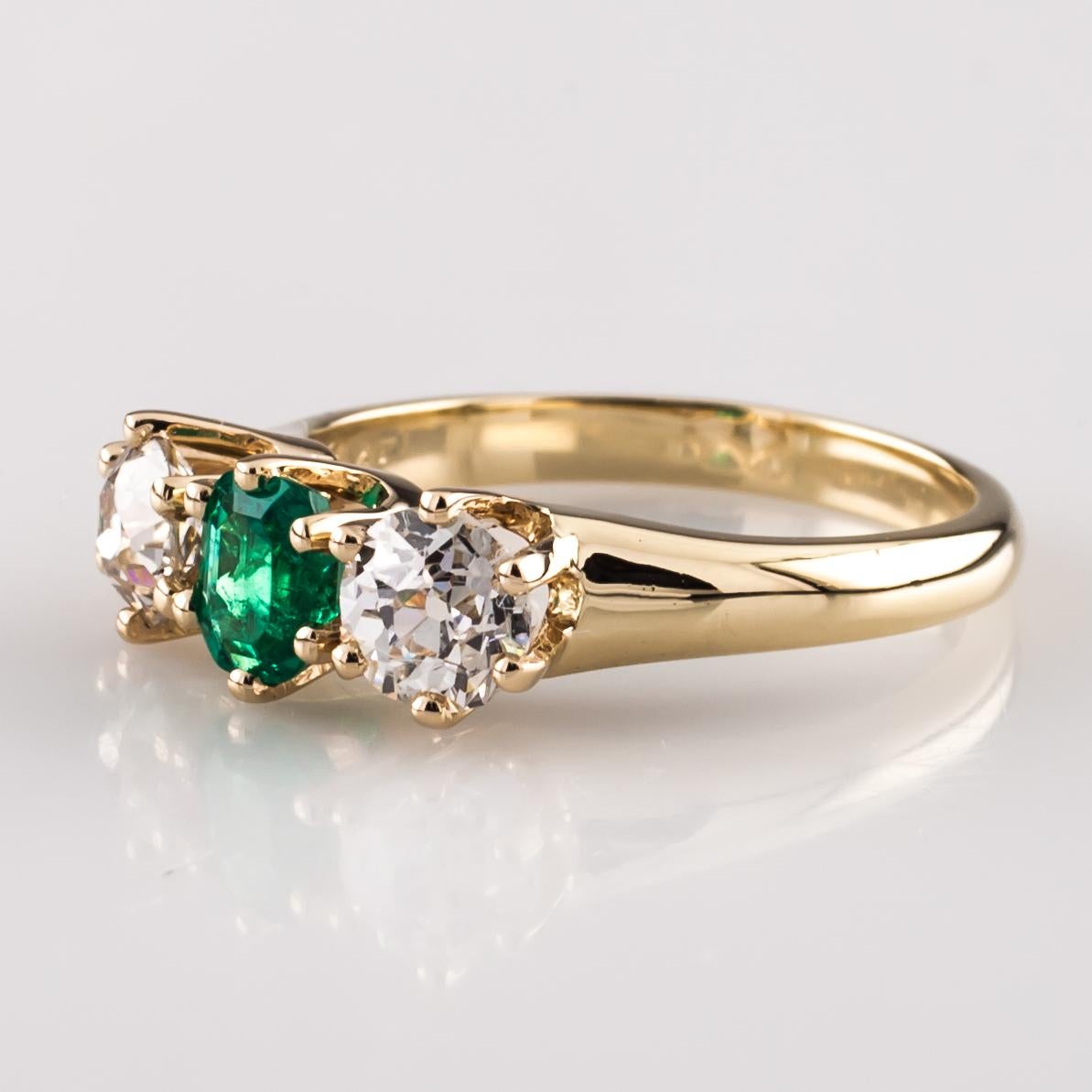 Gorgeous 14k Yellow Gold Emerald and Diamond Ring
Features One Emerald-Cut Colombian Emerald w/ Two Diamond Accent Stones
Total Emerald Weight = Approximately 0.40 ct
Total Diamond Weight = Approximately 0.75 ct
Size 5.25
Total Mass = 3.2 grams