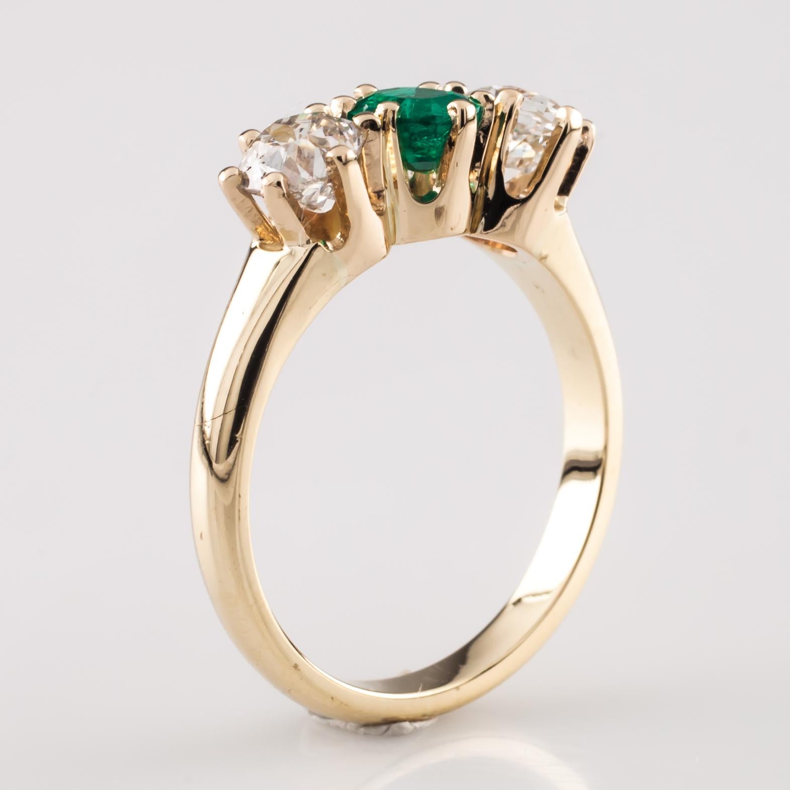 Round Cut Colombian Emerald and Diamond 14 Karat Yellow Gold Three-Stone Ring