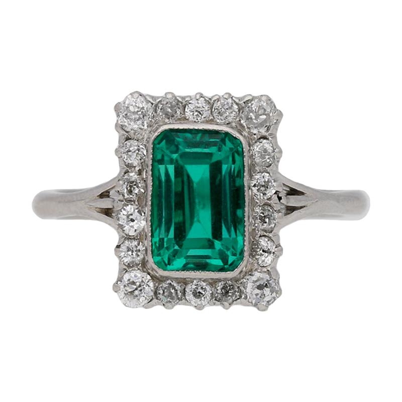 Colombian Emerald and Diamond Cluster Ring, circa 1920 For Sale