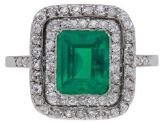 Colombian emerald and diamond cluster ring, French, circa 1915