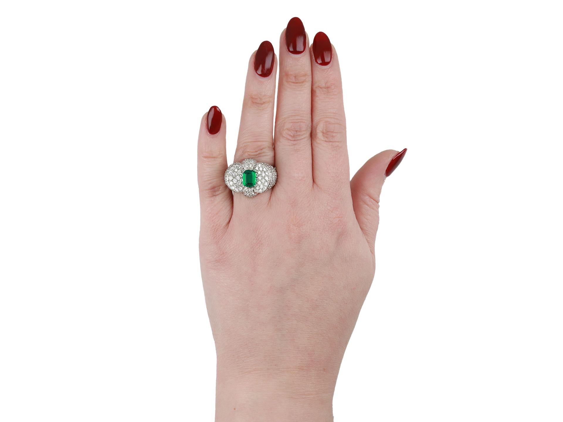 Emerald Cut Colombian emerald and diamond cocktail ring, circa 1950 For Sale