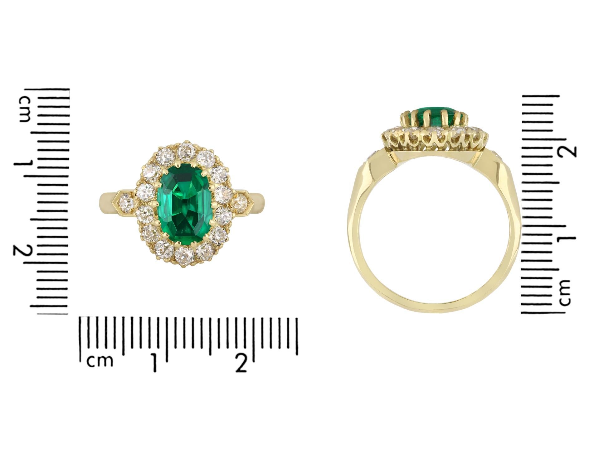 Oval Cut Colombian emerald and diamond coronet cluster ring, circa 1890. For Sale