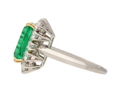 Colombian emerald and diamond coronet cluster ring, French, circa 1960.