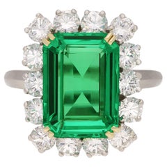 Used Colombian emerald and diamond coronet cluster ring, French, circa 1960. 