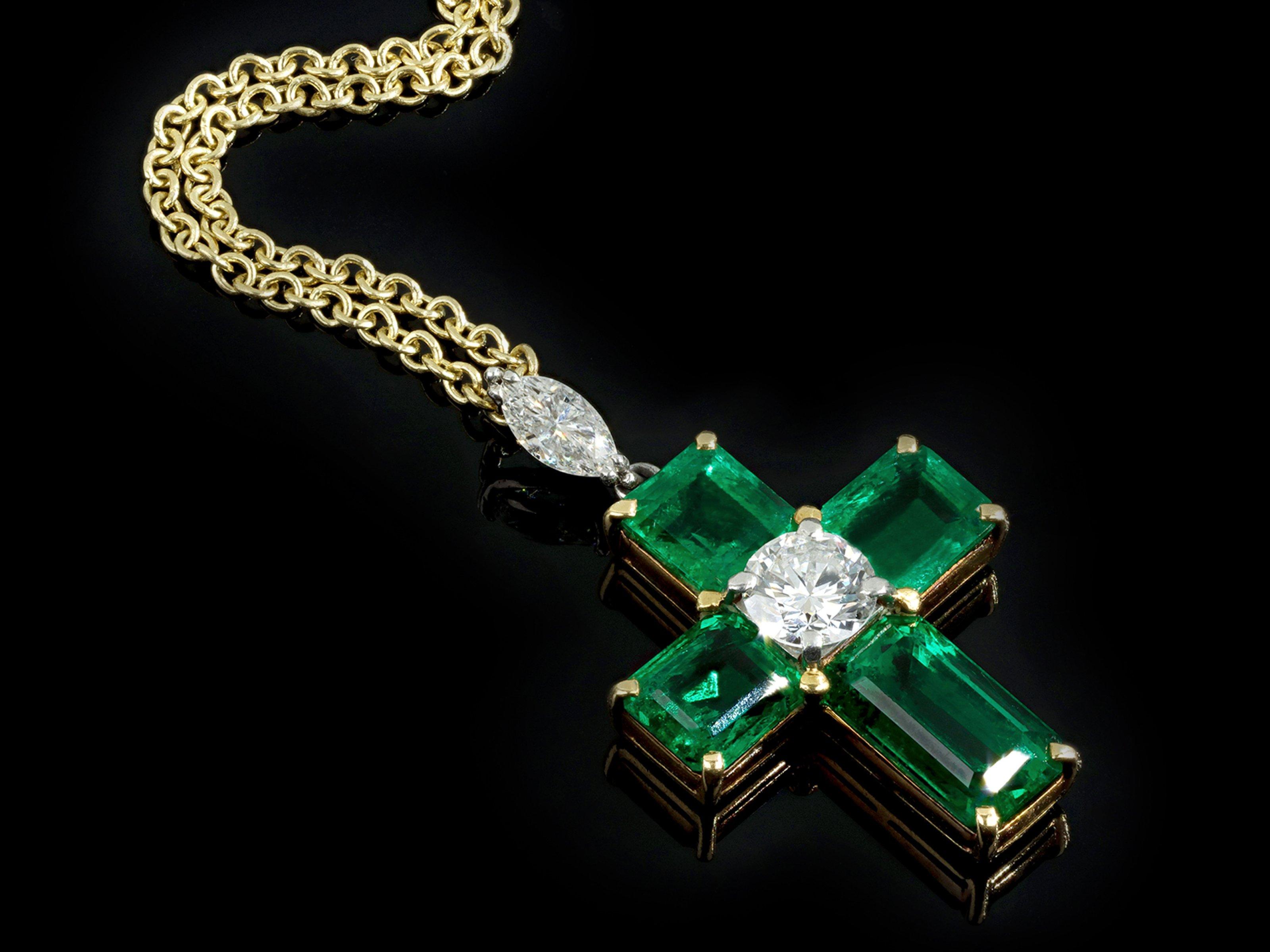 Brilliant Cut Colombian emerald and diamond cross pendant, circa 1970 For Sale