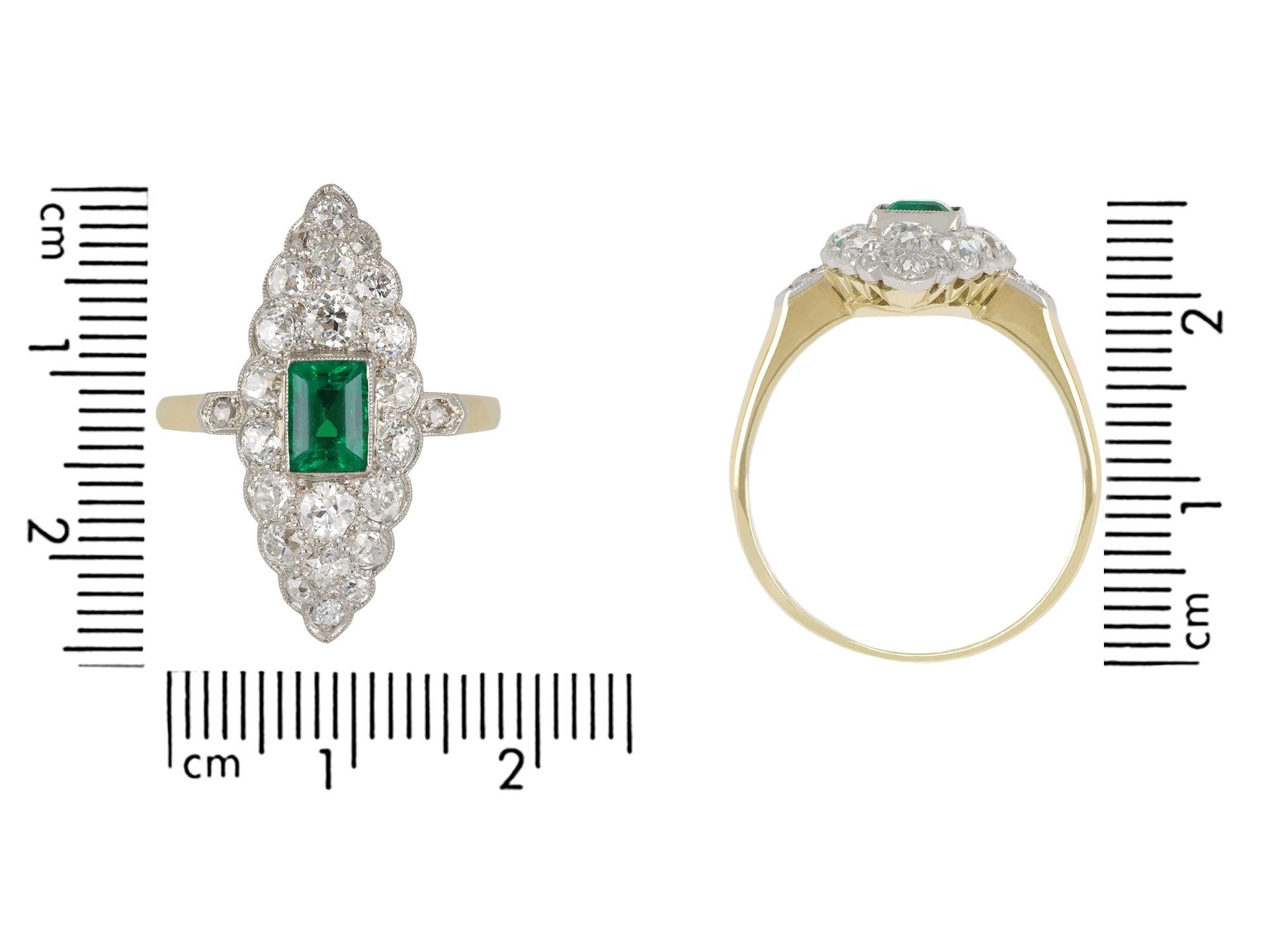 Emerald Cut Colombian emerald and diamond marquise cluster ring, circa 1905. For Sale