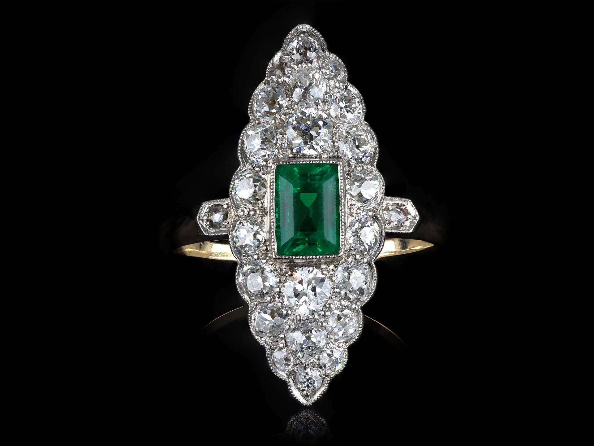 Women's Colombian emerald and diamond marquise cluster ring, circa 1905. For Sale