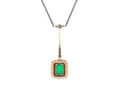 Colombian emerald and diamond pendant, circa 1910.