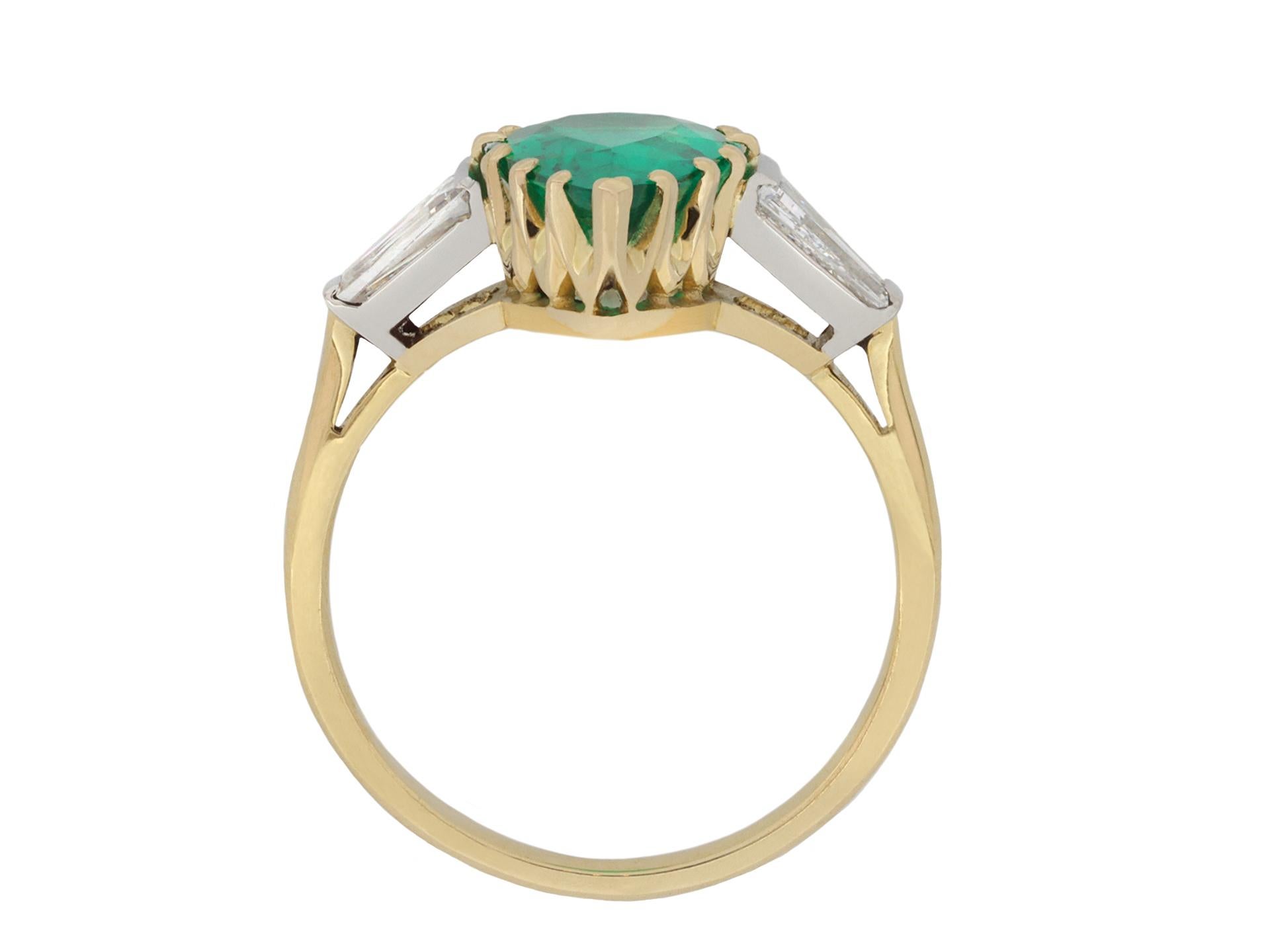 Pear Cut Colombian emerald and diamond ring, English, circa 1970. For Sale