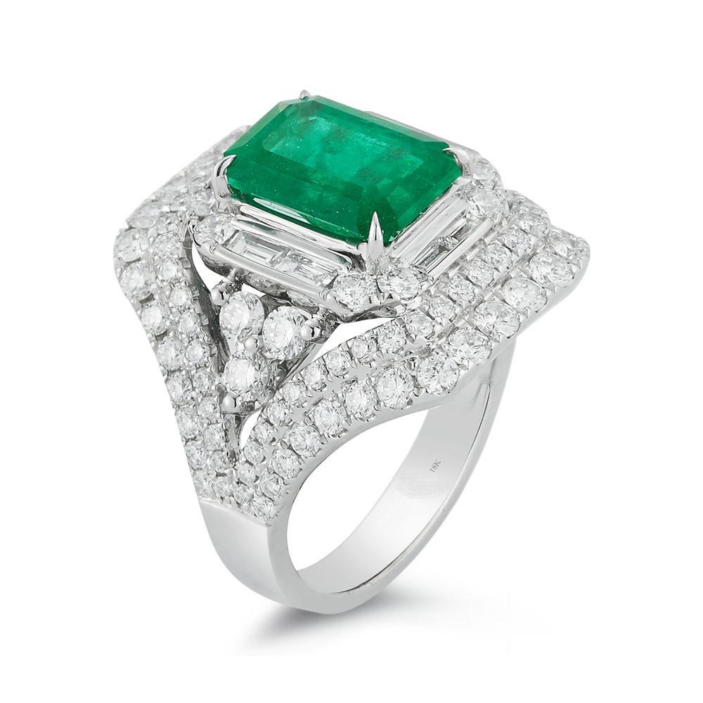 18k White Gold 2.83ct Colombian Emerald and 2.13ct Diamond Ring

A substantial arrangement of diamond accents builds a beautiful
framework for this colombian emerald cut emerald.
Item: # 02940
Metal: 18k W
Lab: C.dunaigre
Color Weight: 2.83